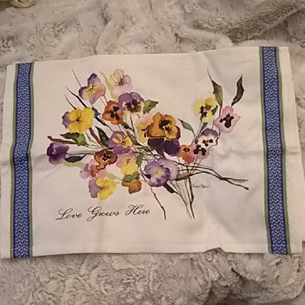 Pansy Tea Towel with "Love Grows Here" in Cursive on Lower Left Front